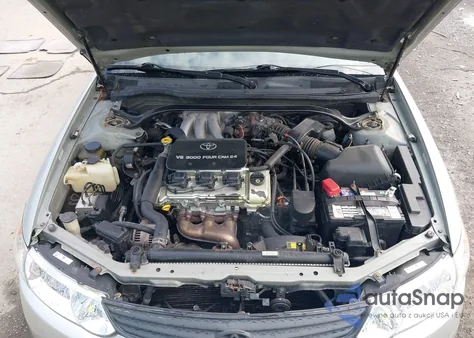 2002 Toyota Camry Solara Sle V6 z USA, uszkodzony, nr VIN 2T1CF28PX2C594971